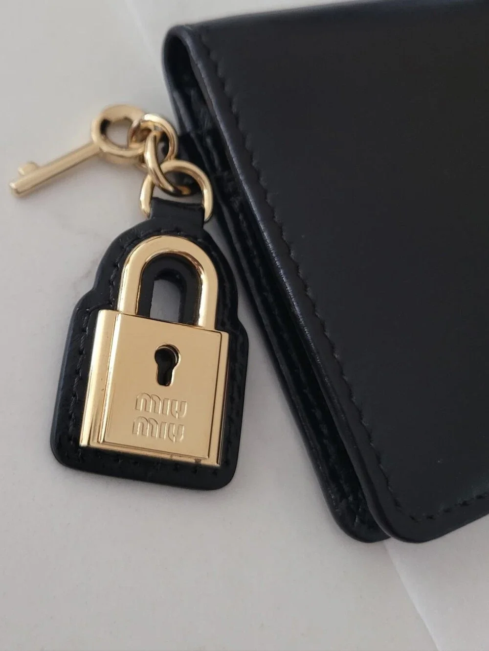 Miu Miu small black leather wallet with gold Pendent Lock Charm